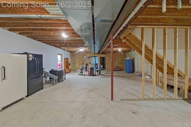3749 Chase Lake Rd, Howell, MI 48855 - basement with fridge