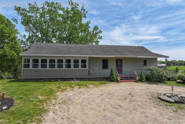 3749 Chase Lake Rd, Howell, MI 48855 - view of front of house featuring a front lawn and roof with shingles