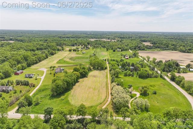 3749 Chase Lake Rd, Howell, MI 48855 - bird's eye view of a heavily wooded area