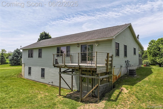 3749 Chase Lake Rd, Howell, MI 48855 - rear view of property with a yard, a shingled roof, a wooden deck, and central AC