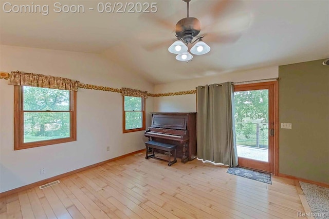 3749 Chase Lake Rd, Howell, MI 48855 - sitting room with a ceiling fan, light wood finished floors, vaulted ceiling, and baseboards