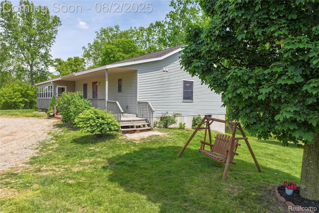 3749 Chase Lake Rd, Howell, MI 48855 - back of house with a yard