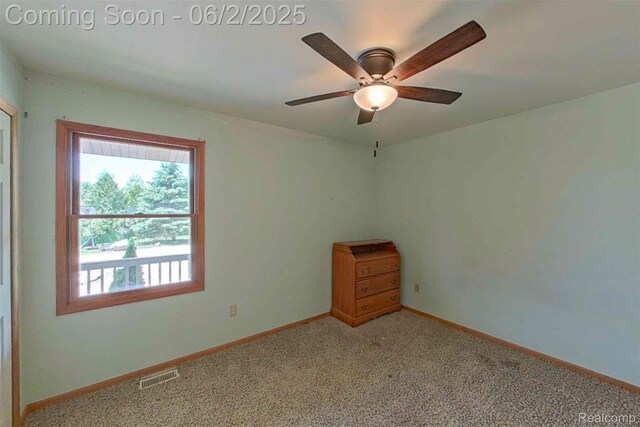 3749 Chase Lake Rd, Howell, MI 48855 - carpeted empty room featuring ceiling fan and baseboards