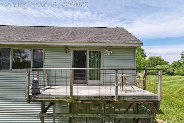 3749 Chase Lake Rd, Howell, MI 48855 - back of property featuring roof with shingles and a lawn