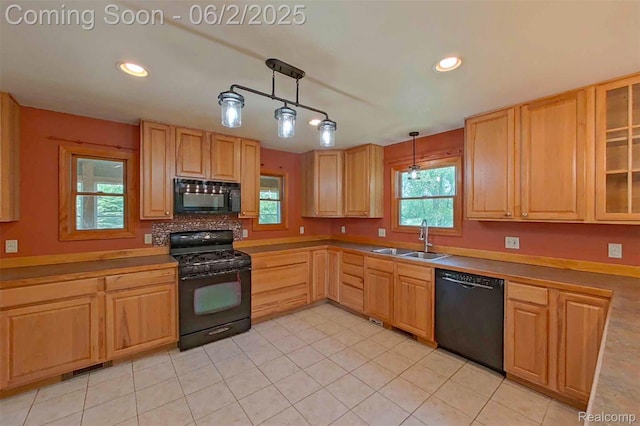 3749 Chase Lake Rd, Howell, MI 48855 - kitchen with black appliances, a sink, light brown cabinets, recessed lighting, and light tile patterned flooring