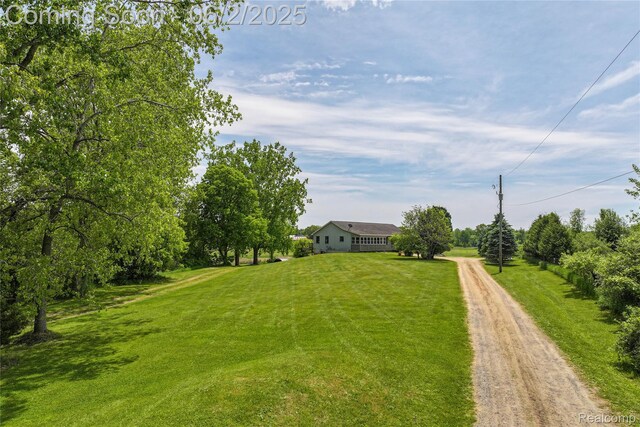 3749 Chase Lake Rd, Howell, MI 48855 - view of green lawn with driveway