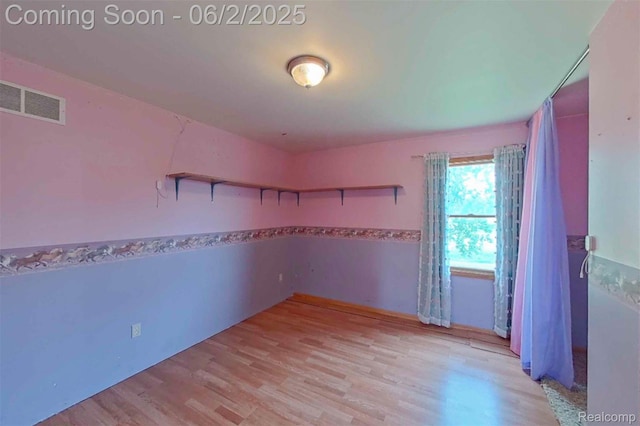3749 Chase Lake Rd, Howell, MI 48855 - unfurnished room featuring light wood-type flooring