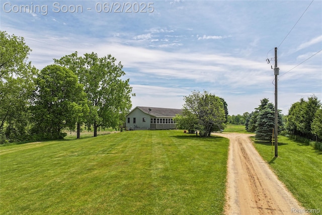 3749 Chase Lake Rd, Howell, MI 48855 - view of green lawn featuring driveway