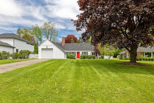 view of front of home with asphalt driveway, a chimney, a garage, and board and batten siding