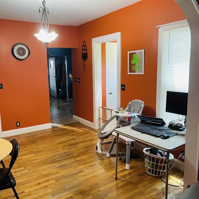 326 N Oak St, Owosso, MI 48867 - office space with arched walkways, baseboards, and wood finished floors