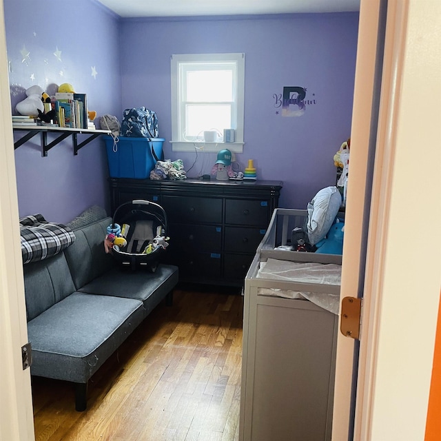 326 N Oak St, Owosso, MI 48867 - bedroom with light wood-type flooring