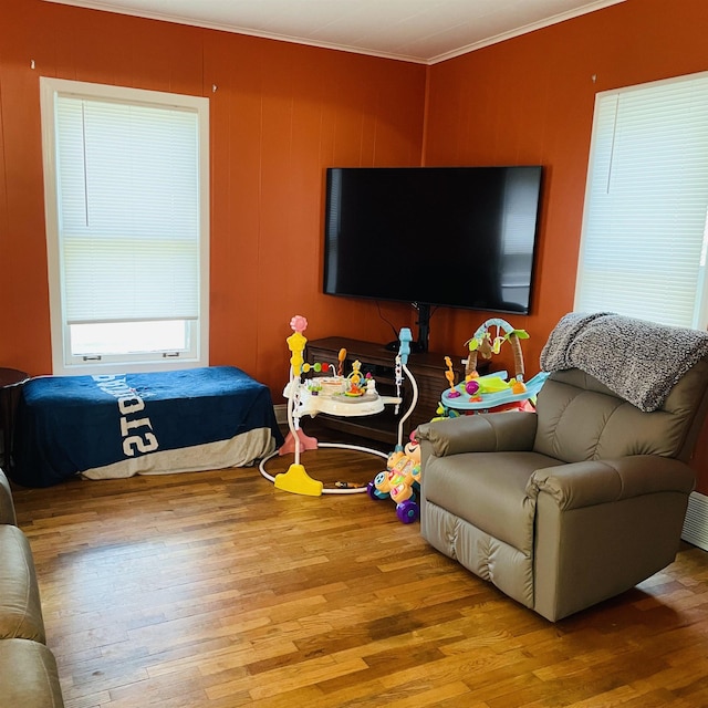 326 N Oak St, Owosso, MI 48867 - living area featuring crown molding and wood finished floors