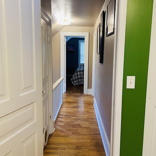 326 N Oak St, Owosso, MI 48867 - hall with light wood-style flooring and lofted ceiling