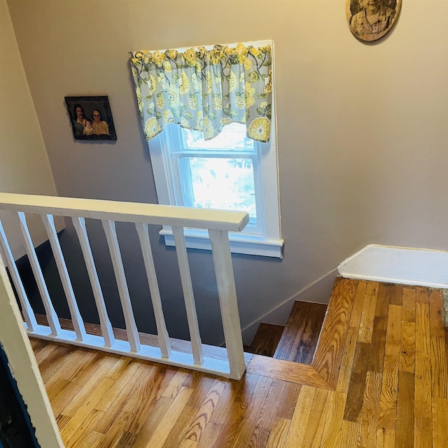 326 N Oak St, Owosso, MI 48867 - stairway featuring wood finished floors and baseboards