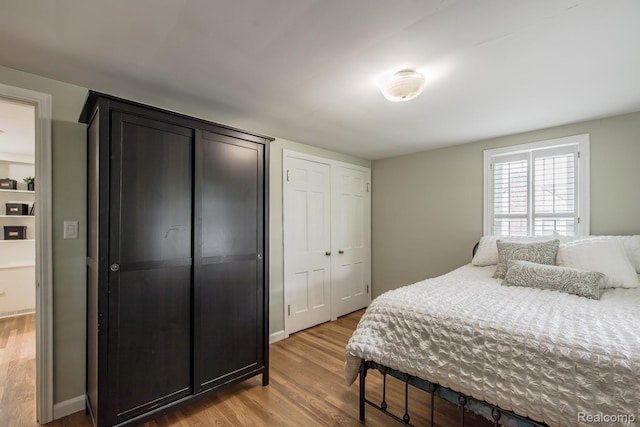 3070 Old Orchard Dr, Waterford, MI 48328 - bedroom featuring wood finished floors