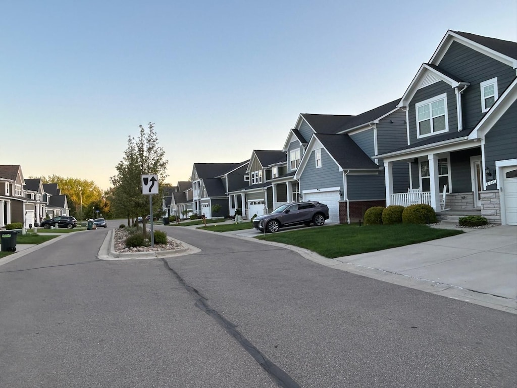 31065 Tremont Ln, Franklin, MI 48025 - view of asphalt road with a residential view