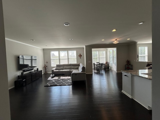31065 Tremont Ln, Franklin, MI 48025 - living area featuring ornamental molding, recessed lighting, baseboards, and dark wood finished floors