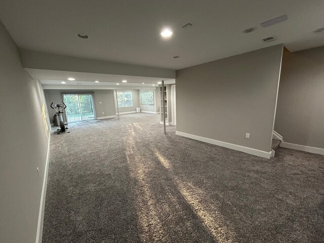 31065 Tremont Ln, Franklin, MI 48025 - unfurnished living room with recessed lighting, carpet, baseboards, and stairs
