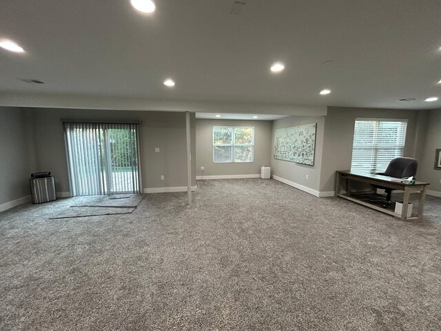 31065 Tremont Ln, Franklin, MI 48025 - living area with recessed lighting, carpet, baseboards, and an office area