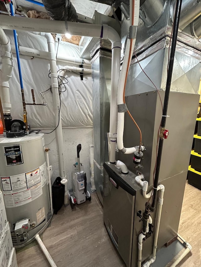 31065 Tremont Ln, Franklin, MI 48025 - utility room with gas water heater and heating unit
