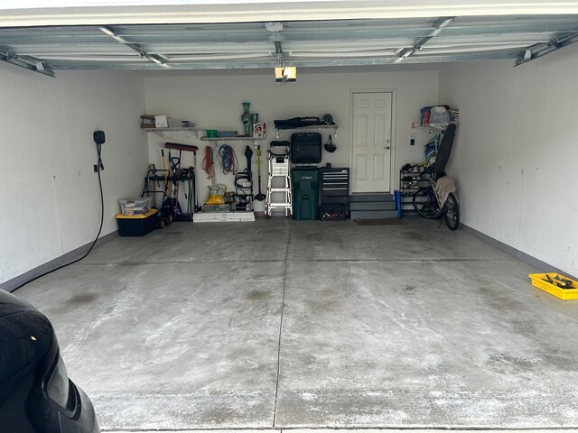 31065 Tremont Ln, Franklin, MI 48025 - garage with a garage door opener
