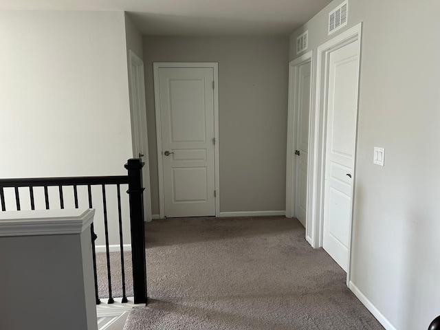 31065 Tremont Ln, Franklin, MI 48025 - hall featuring carpet, an upstairs landing, and baseboards