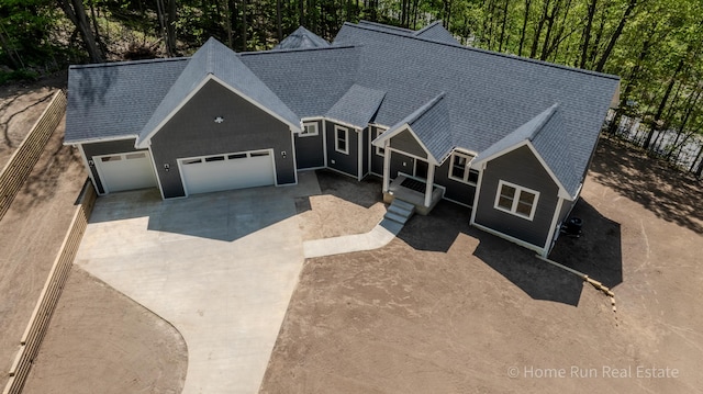 view of front of home featuring a garage and concrete driveway