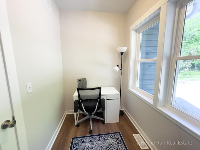 8828 Division Ave S, Byron Center, MI 49315 - home office with dark wood-style flooring and baseboards