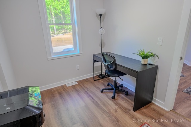 8828 Division Ave S, Byron Center, MI 49315 - office area featuring baseboards and wood finished floors