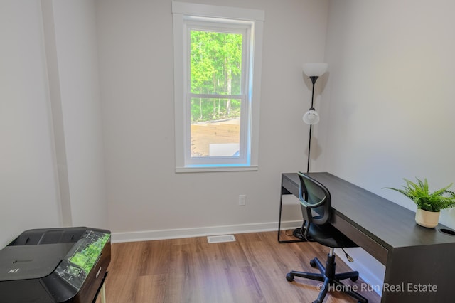 8828 Division Ave S, Byron Center, MI 49315 - home office featuring wood finished floors and baseboards