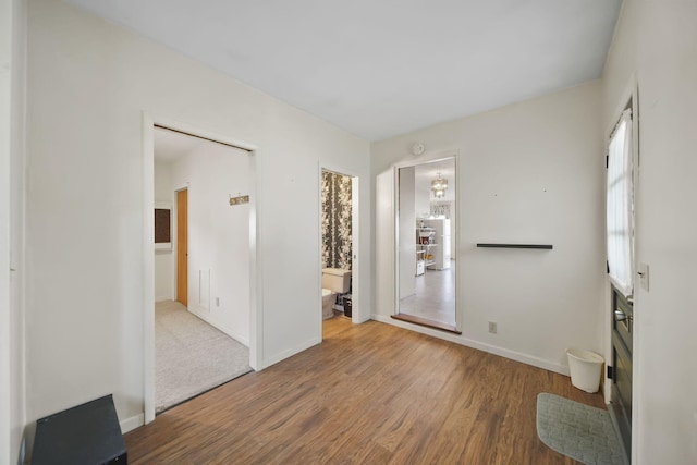 555 S Lakeside Dr, Michigan Center, MI 49254 - unfurnished room featuring wood finished floors and baseboards
