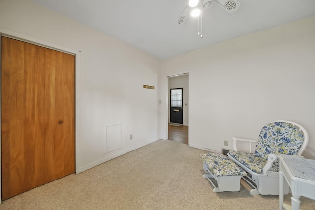 555 S Lakeside Dr, Michigan Center, MI 49254 - sitting room with carpet, a ceiling fan, and baseboards