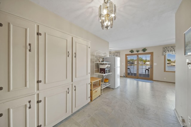 555 S Lakeside Dr, Michigan Center, MI 49254 - hallway featuring baseboards