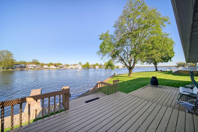 555 S Lakeside Dr, Michigan Center, MI 49254 - dock area with a yard and a water view