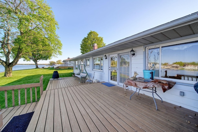 555 S Lakeside Dr, Michigan Center, MI 49254 - wooden deck featuring a water view and a yard