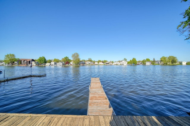 555 S Lakeside Dr, Michigan Center, MI 49254 - dock featuring a water view
