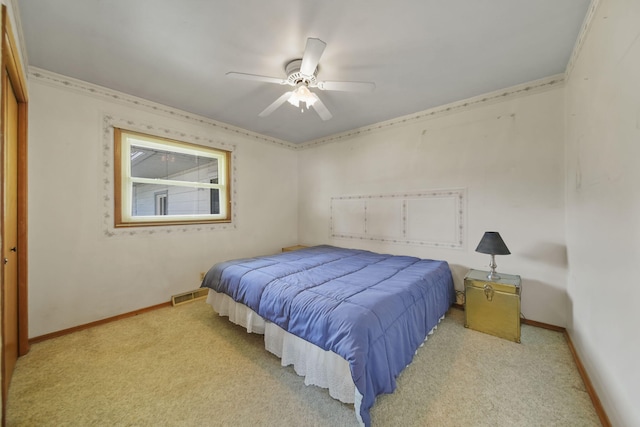 555 S Lakeside Dr, Michigan Center, MI 49254 - bedroom with carpet, baseboards, ornamental molding, and ceiling fan