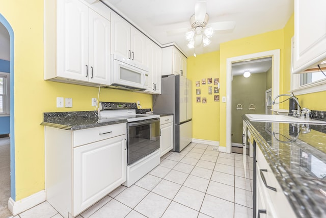 885 Hawthorne Ave, Ypsilanti, MI 48198 - kitchen featuring white appliances, a sink, white cabinetry, a ceiling fan, and baseboards