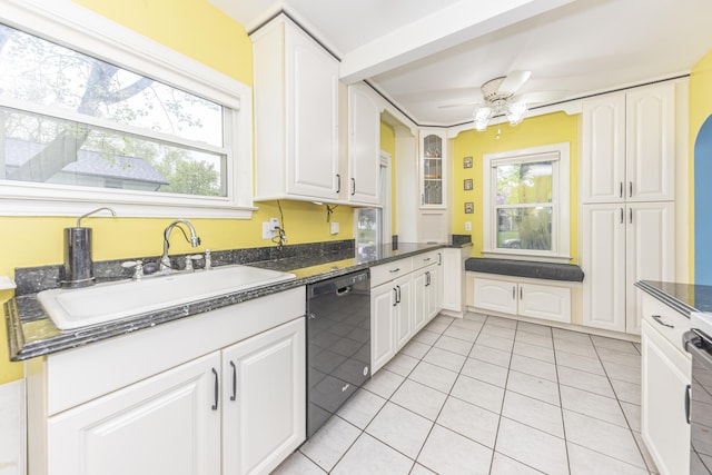 885 Hawthorne Ave, Ypsilanti, MI 48198 - kitchen featuring dishwasher, a sink, light tile patterned flooring, and white cabinetry