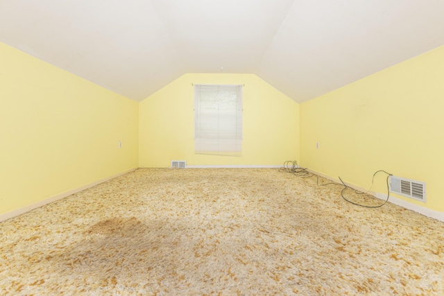885 Hawthorne Ave, Ypsilanti, MI 48198 - bonus room featuring vaulted ceiling, carpet, and baseboards