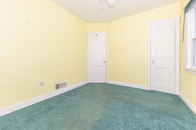 885 Hawthorne Ave, Ypsilanti, MI 48198 - carpeted spare room with baseboards and ceiling fan
