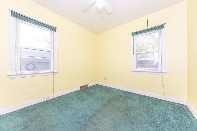 885 Hawthorne Ave, Ypsilanti, MI 48198 - carpeted empty room featuring ceiling fan and baseboards