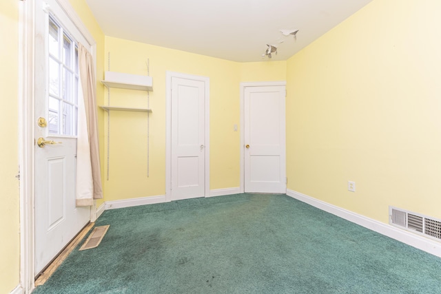 885 Hawthorne Ave, Ypsilanti, MI 48198 - unfurnished bedroom with carpet and baseboards