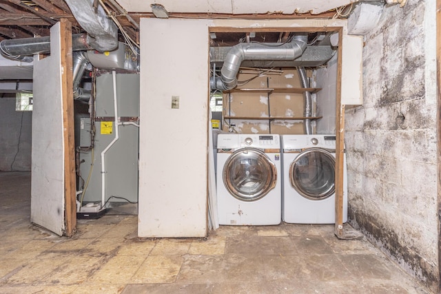885 Hawthorne Ave, Ypsilanti, MI 48198 - unfinished basement featuring washing machine and dryer and heating unit