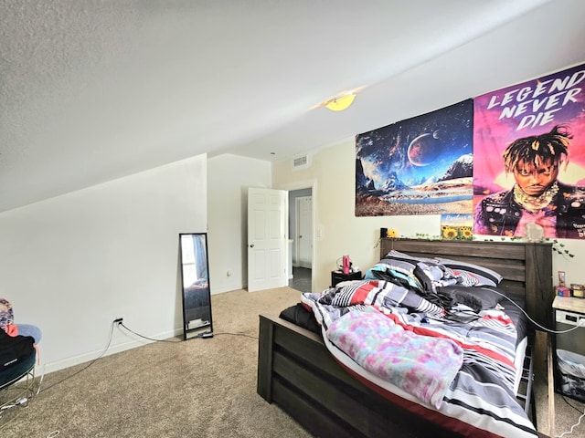 carpeted bedroom with lofted ceiling and baseboards