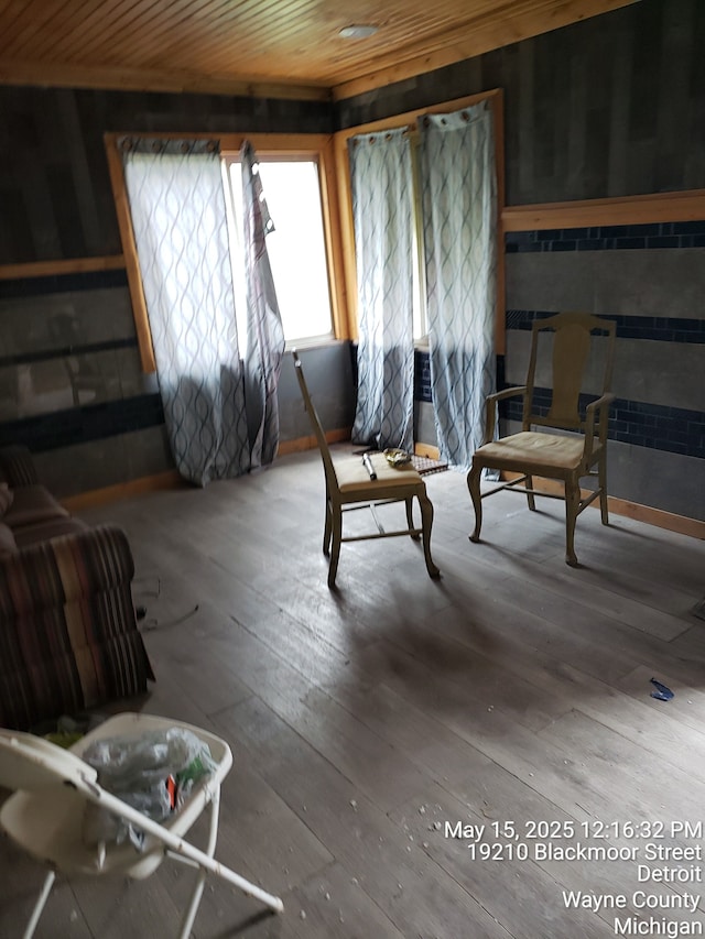 19200 Blackmoor St, Detroit, MI 48234 - living area with wooden ceiling, hardwood / wood-style floors, and wooden walls