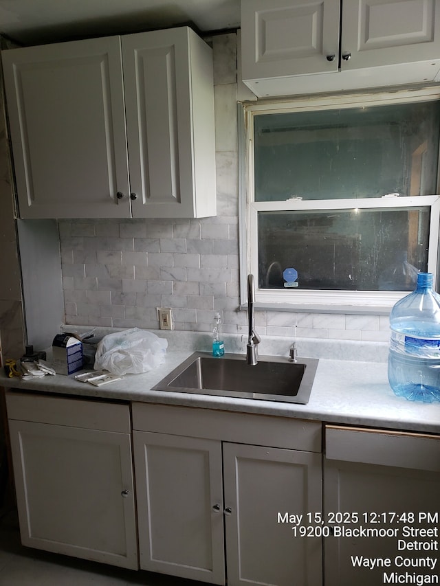 19200 Blackmoor St, Detroit, MI 48234 - kitchen with a sink and white cabinets