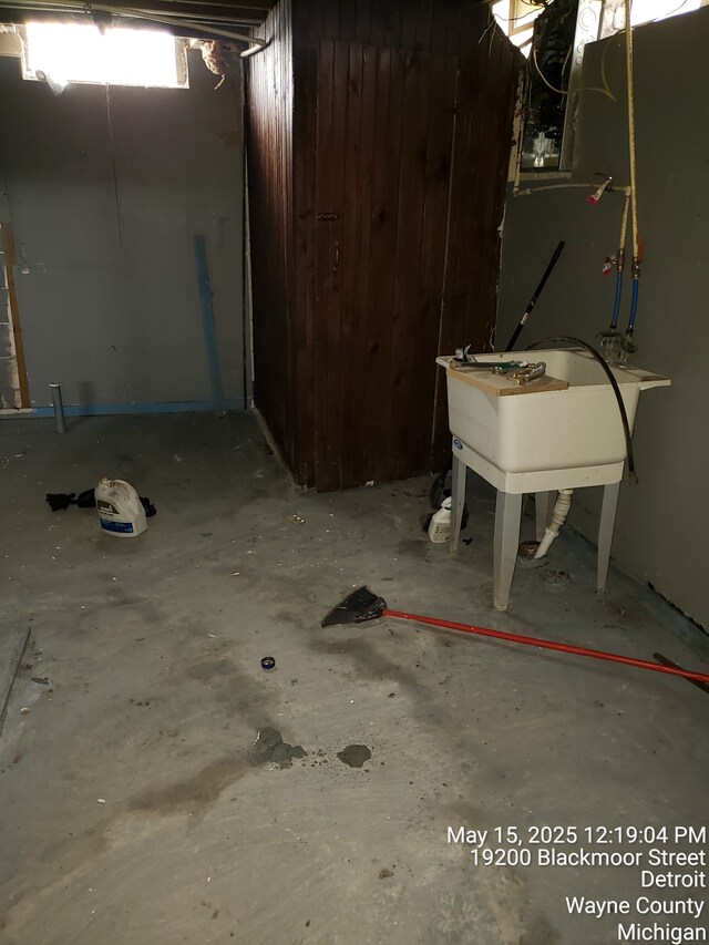 19200 Blackmoor St, Detroit, MI 48234 - unfinished basement featuring wooden walls