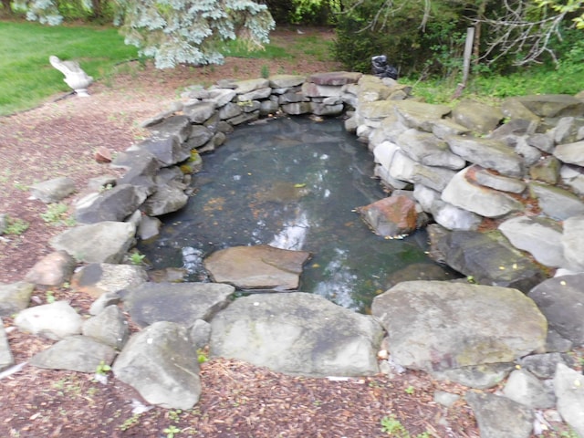 5244 Folkstone Dr, Troy, MI 48085 - exterior view of a garden pond