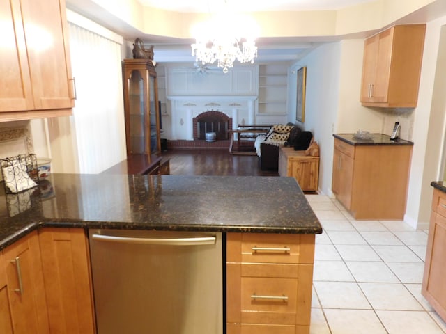 5244 Folkstone Dr, Troy, MI 48085 - kitchen featuring dishwasher, open floor plan, a chandelier, light tile patterned floors, and dark stone countertops